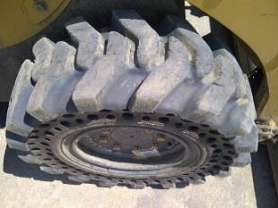 Nu-Air DT tire on CAT 226B_3 Nu-Air DT tire on CAT 226B_3