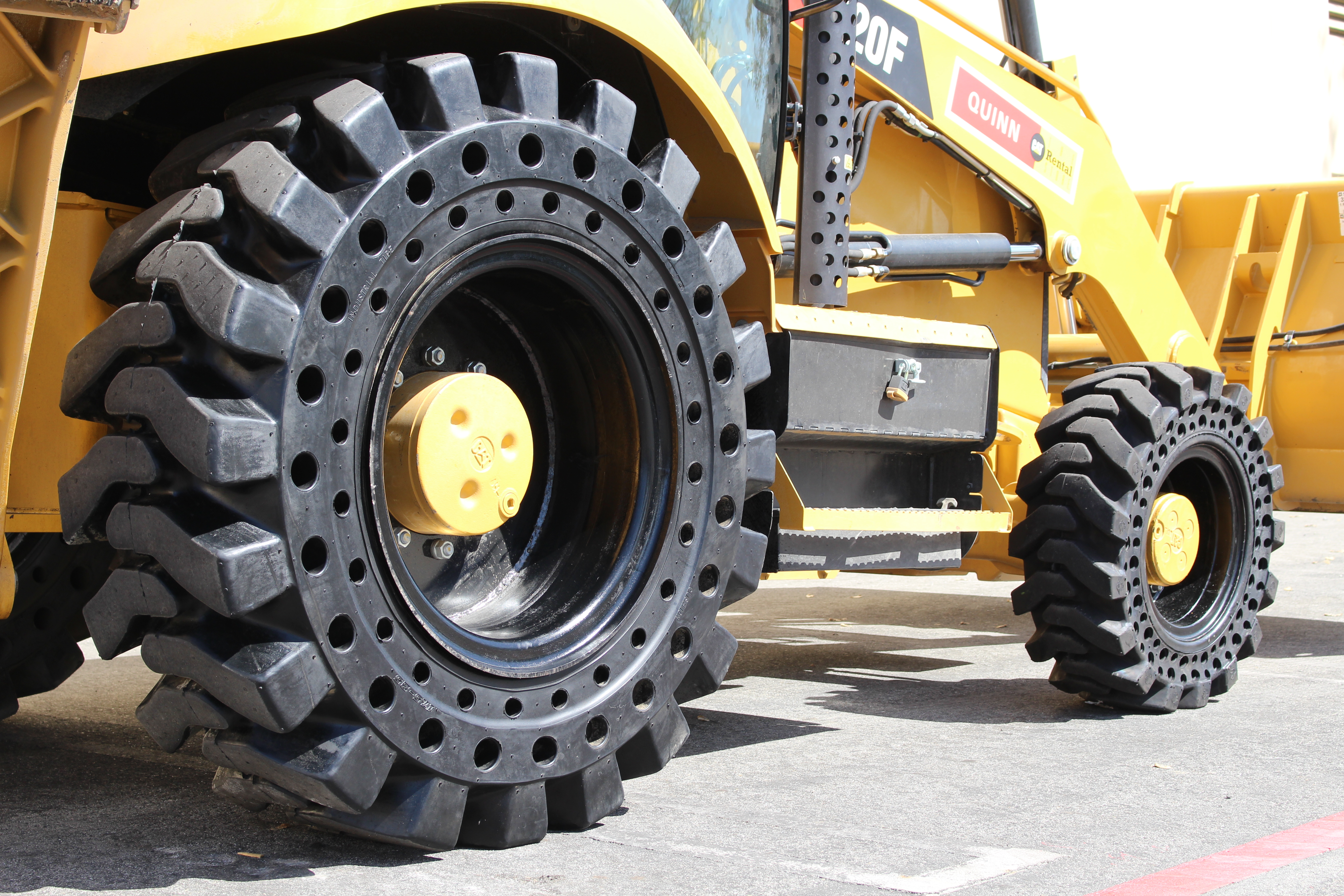 McLaren Solid Cushion Tires for Loader Backhoes McLaren Solid Cushion Tires for Loader Backhoes